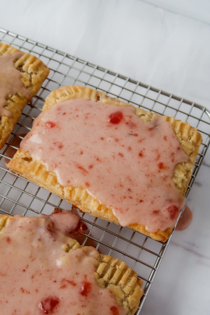 Gluten Free Sourdough Poptarts from Wonders of Cooking. Homemade Strawberry poptarts are one of my favorite gluten free sourdough discard recipes.